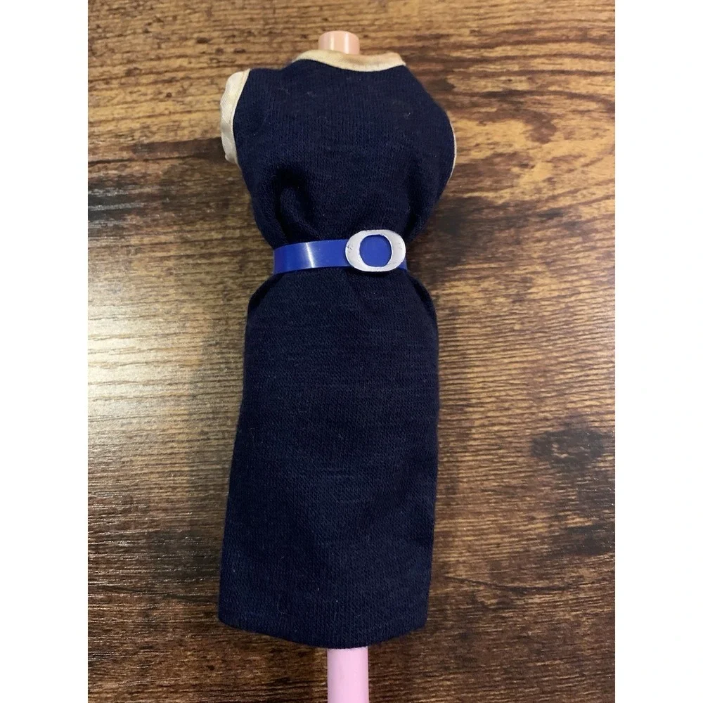 navy blue dress red belt Navy blue dress with gold turn button and black belt Amuse